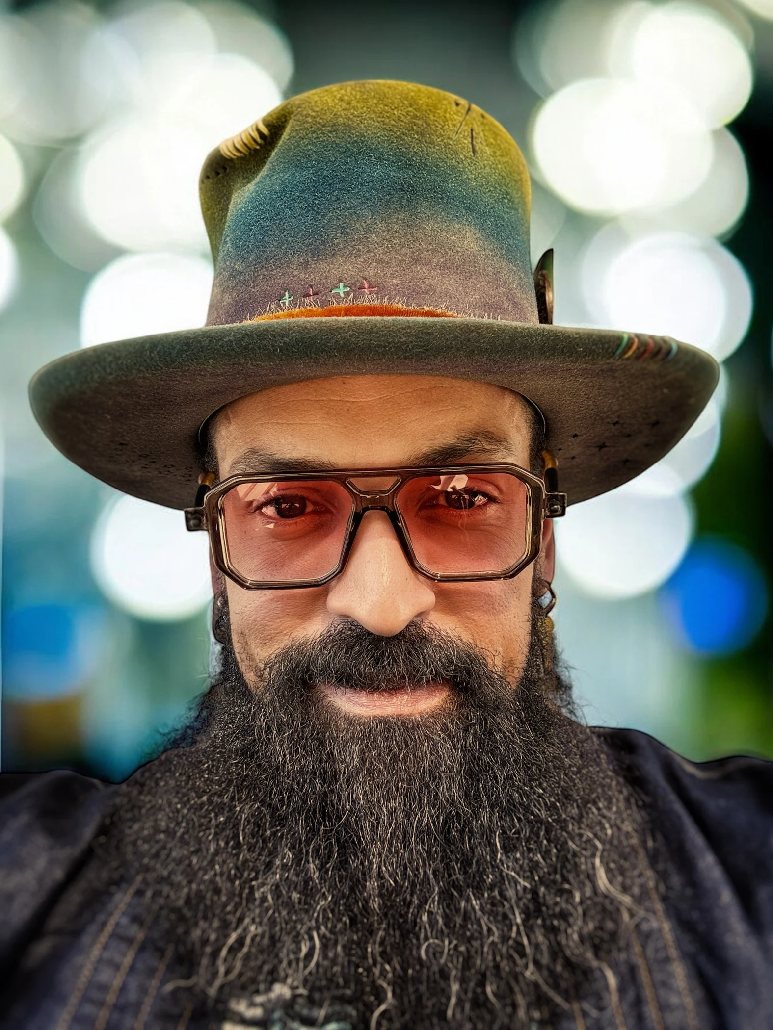 Portrait of Jorge La Sombra wearing a handmade hat